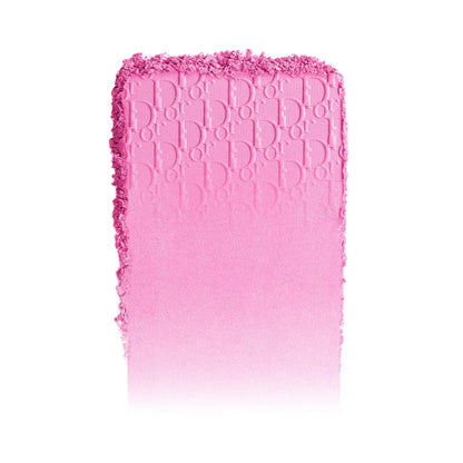 Pink makeup product with Dior branding on a white background